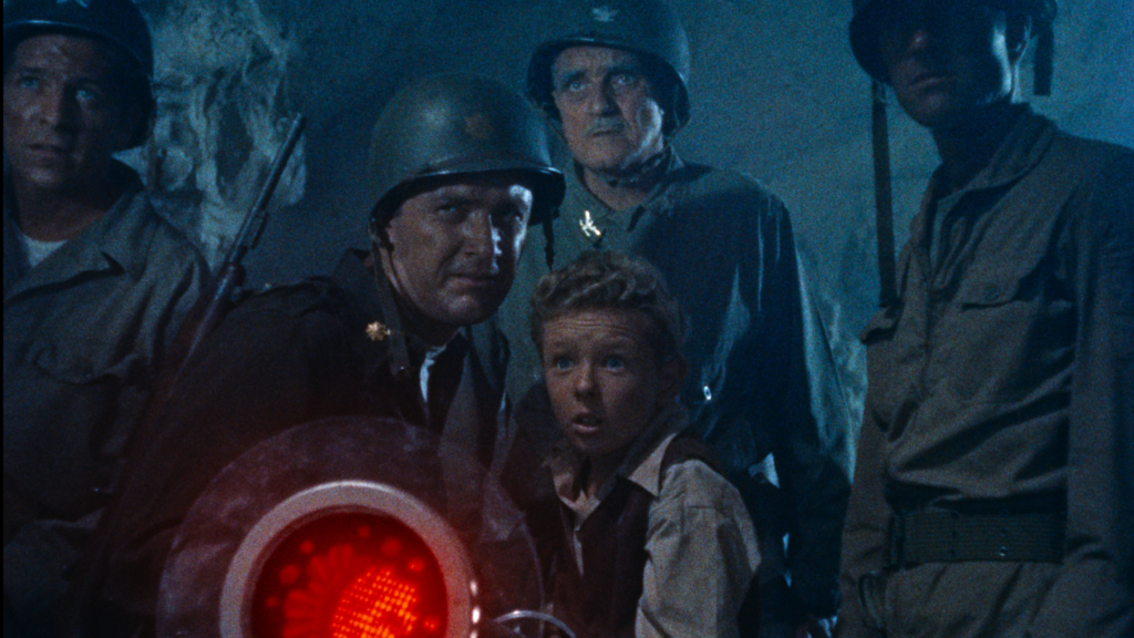 Young boy and military face off against aliens